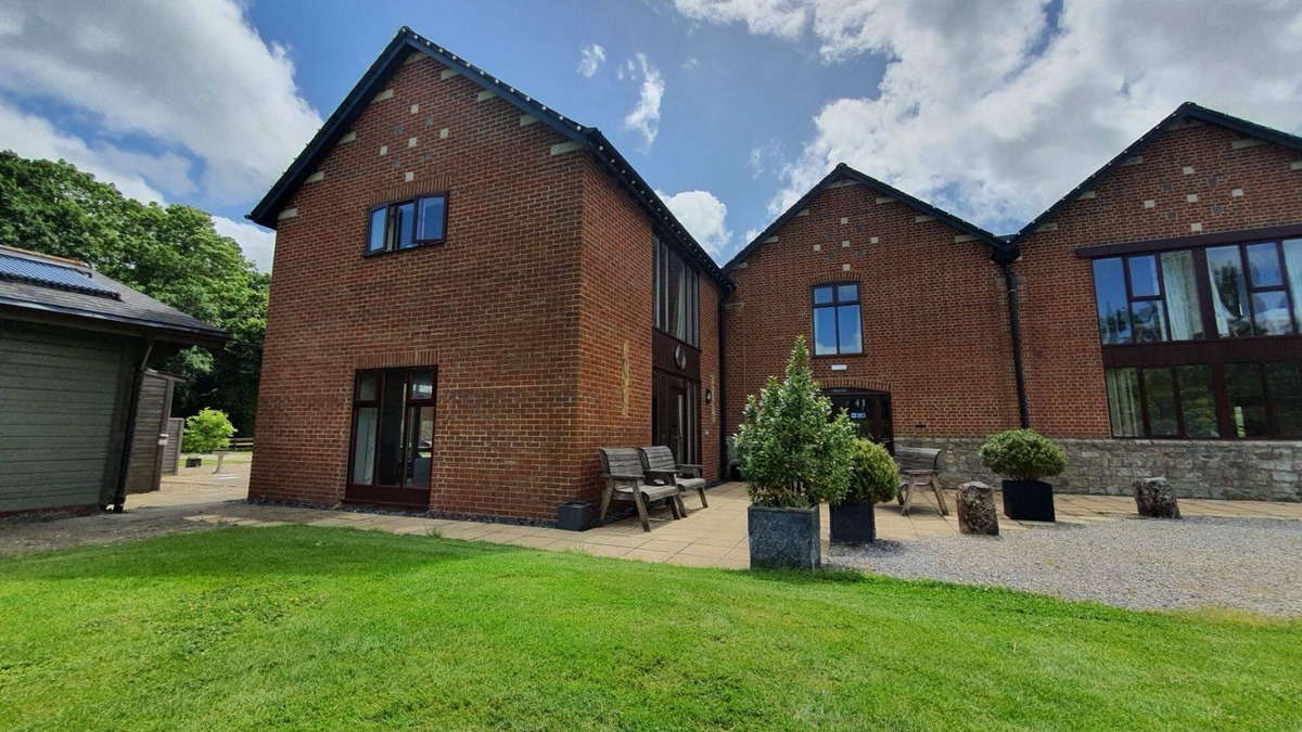 Woolland Cottage | Luxury barn conversion sleeping 16 with hot tub and ensuite bedrooms