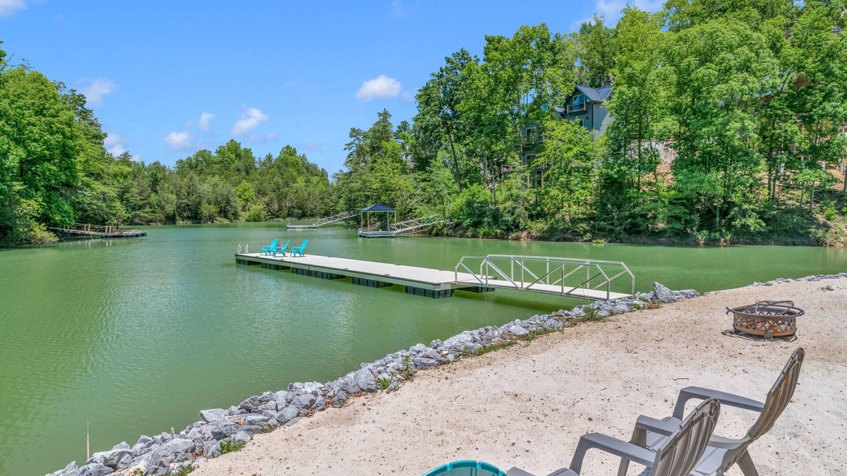Sevierville Cabin | Luxury lakefront home with private pool, hot tub, & free attraction tickets