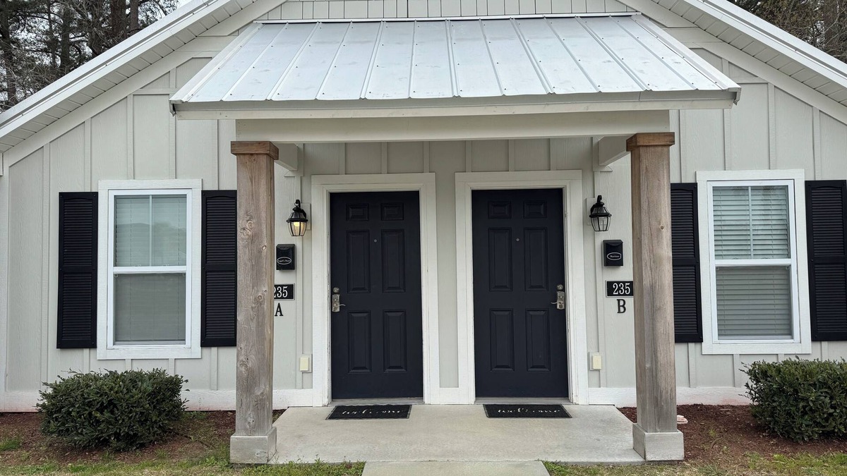 Elizabethtown Resort | Luxury Lodging, Lakefront View, King Bed w/Private Bath, Private Patio.