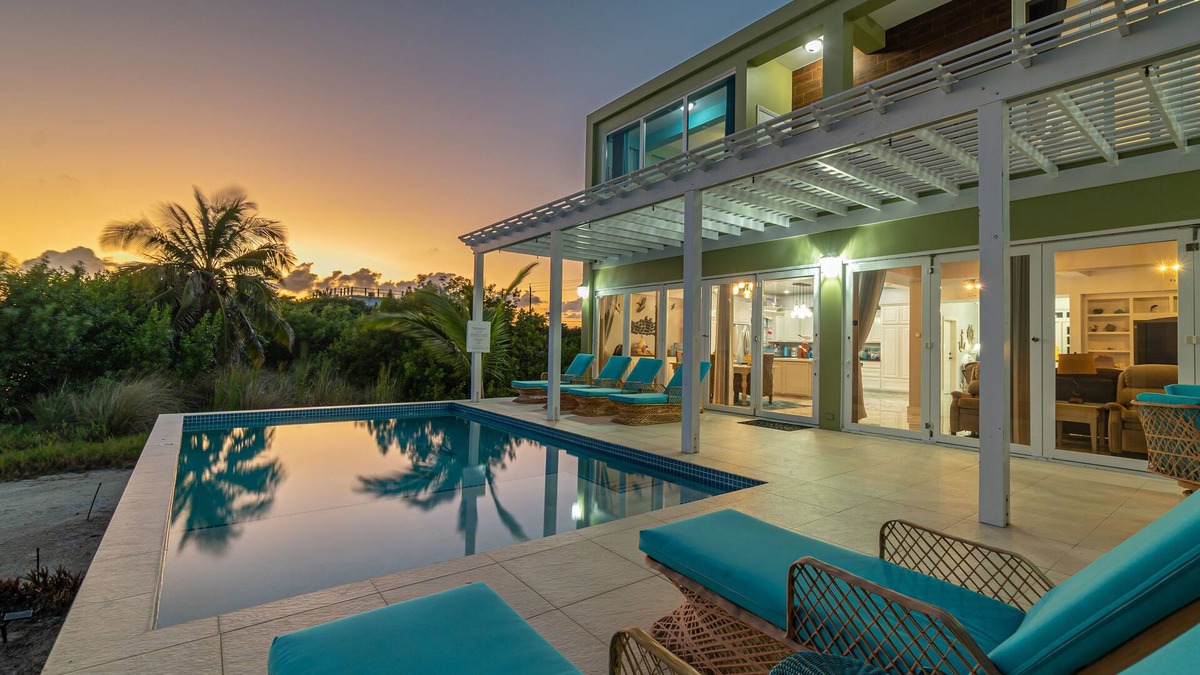 San Pedro House | Luxury Oasis: Serene Beachfront with Pool & Dock