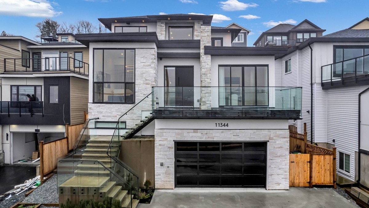 Surrey House | Luxury River View Home
