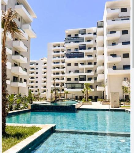 Ain Harrouda Apartment | luxury studio vue Sur Piscine, mer et Park a Zenata City Eco