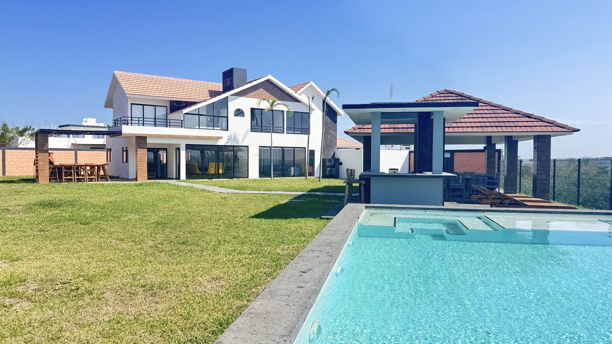 Alvarado House | Luxury villa 🌅 with lagoon-facing bathtub, jacuzzi, grill and pizza oven 🍕