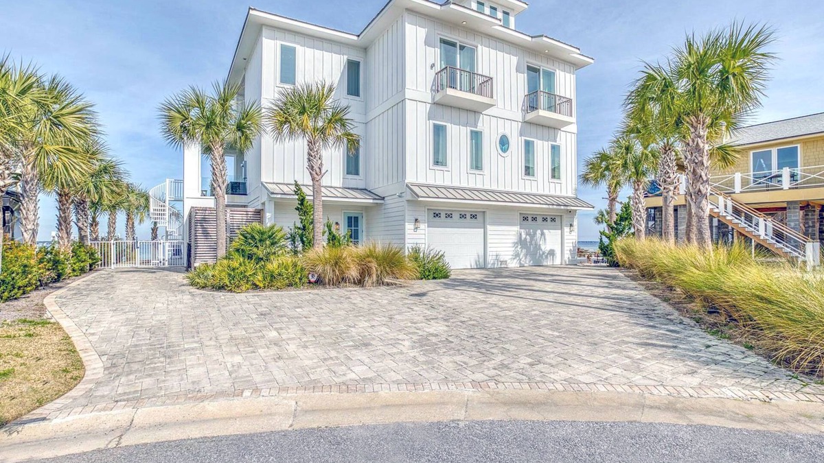 Pensacola Beach House | Luxury Water Front Home with a Private (Heated) Pool & Swim-up Bar!