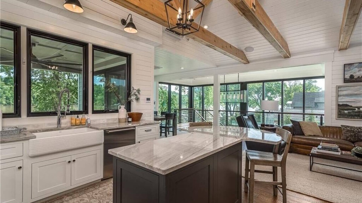 Otisco House | Luxury waterfront home. Fireplaces, patios & views