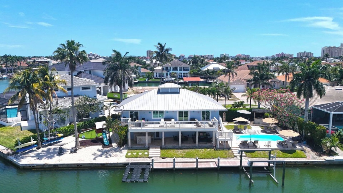 Marco Island House | Luxury Waterfront Pool Home, Walk to Beach, Kayaks SUP's, Bikes, Pool/PPong Tbl