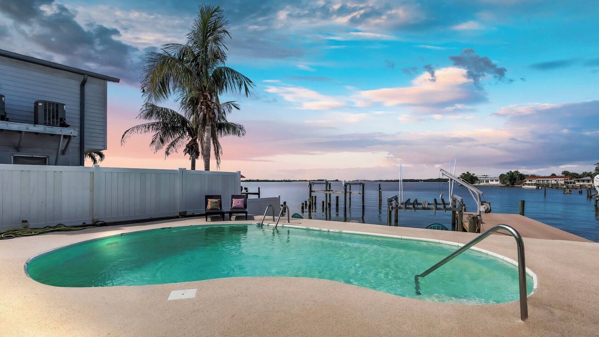 St. Petersburg - Clearwater House | Luxury Waterfront Farmhouse Retreat w/Saltwater Pool, Dock & Tiki Bar