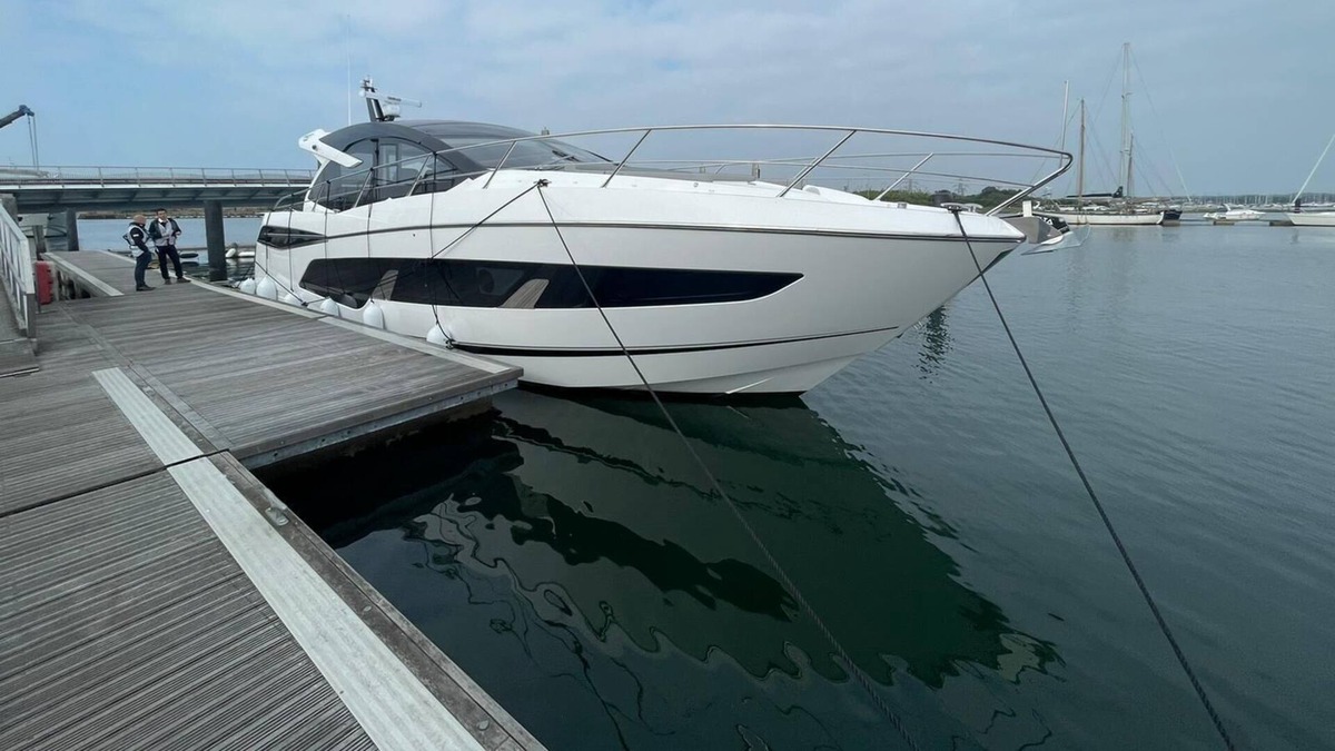 Lower Swanwick Boat Rental | Luxury yacht moored in a tranquil marina setting