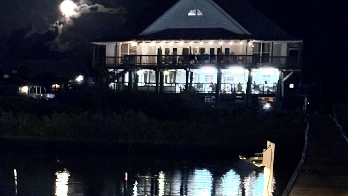Grand Isle House | Majestic bayfront home. 450’ pier w/boat access, crabbing, fishing, & swimming.