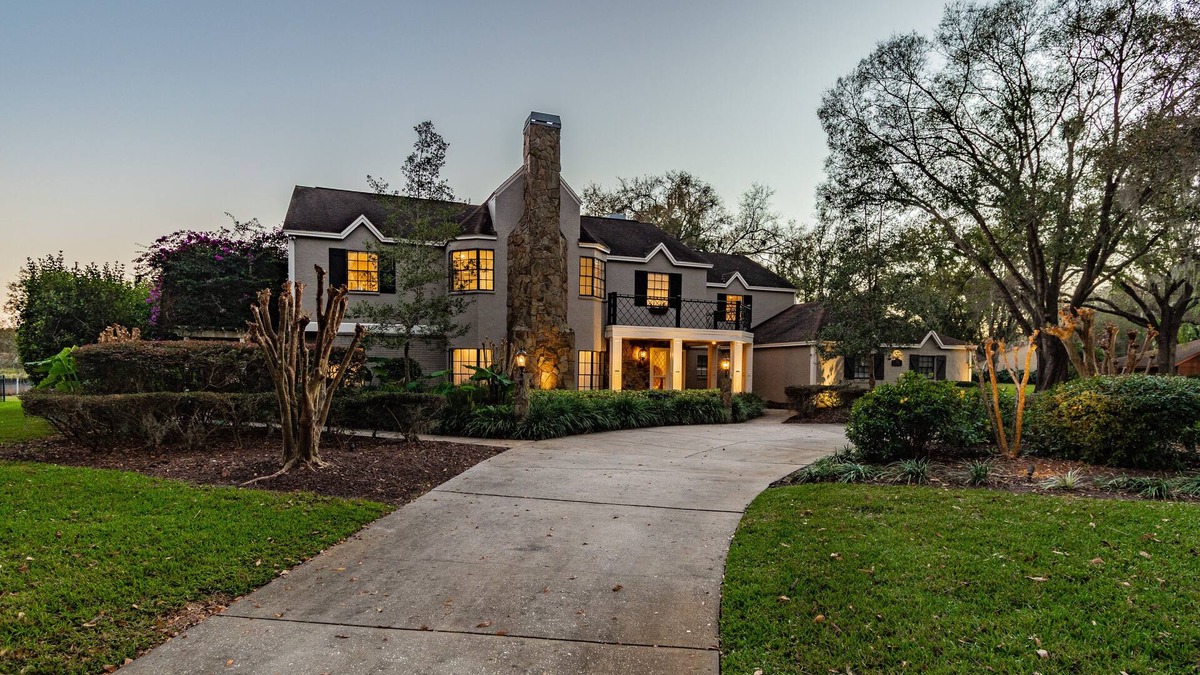 Lutz House | Majestic Brant Manor: Stately 8 Bdrm, Lakefront Manor w/Pool, 15Min to City
