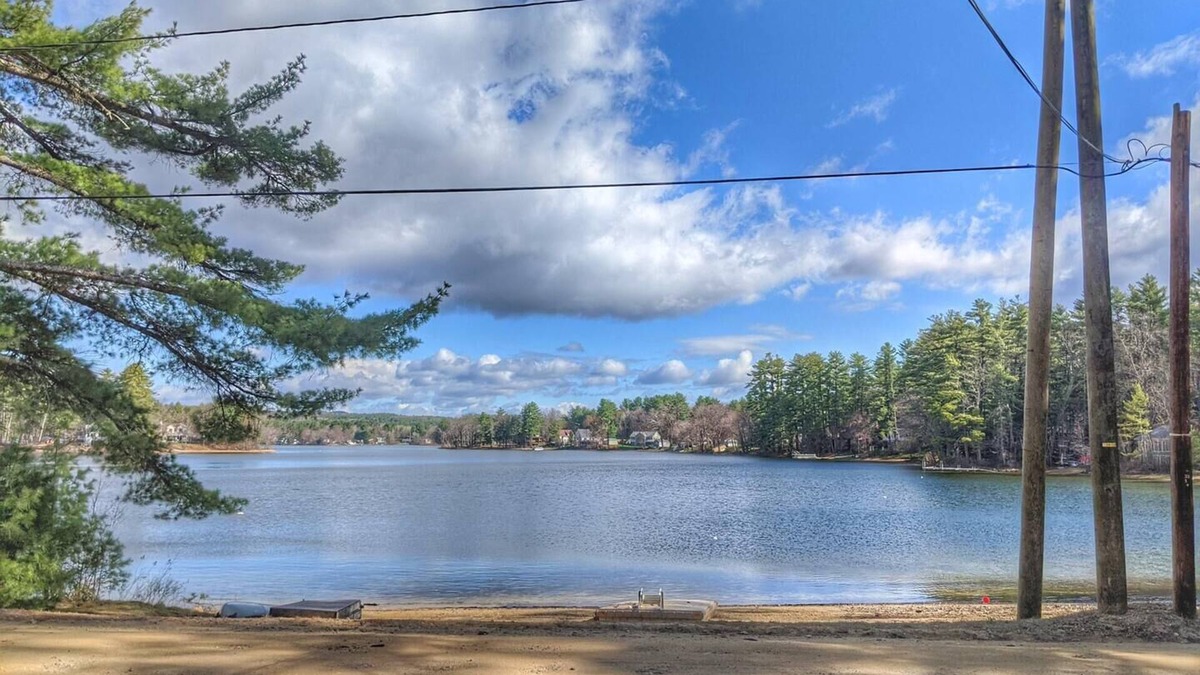 Lochmere House | Makin' Waves on Silver Lake with sandy beach and dock