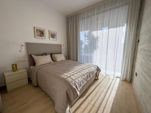 Paphos Apartment | Malberry Park 103 - Modern Apt with Shared Heated Pool, Sauna, Gym, Jacuzzi