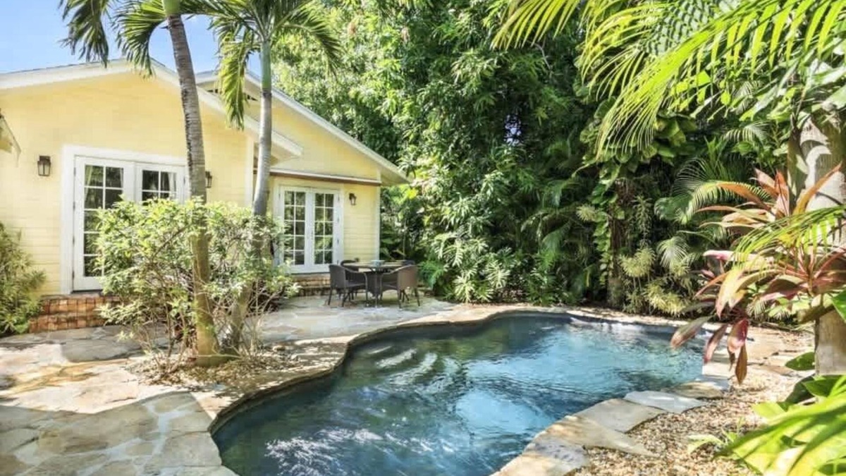 Flamingo Parks House | Mango Haus - Savor Tropical Living by a Lush Lagoon Pool