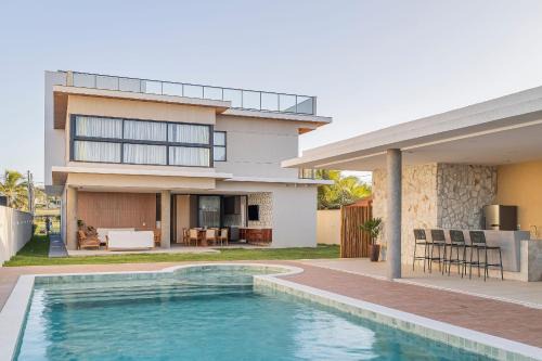 Pecém House | Mansão Summerville em Cumbuco por Carpediem