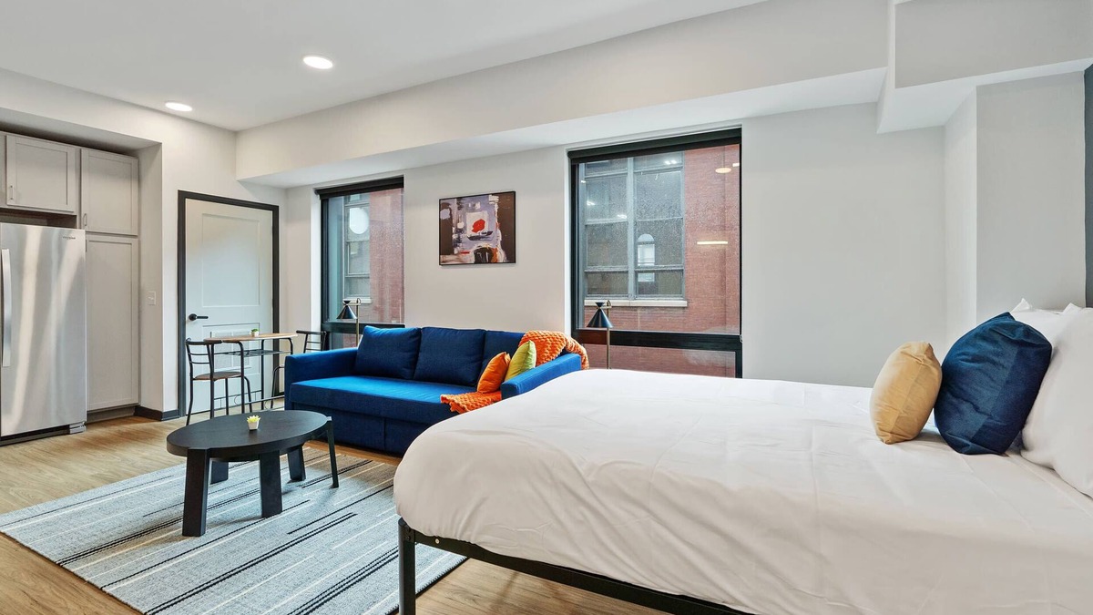 Lockerbie Square Apartment | Mass w parking lounge & roof deck #15 | Cozysuites