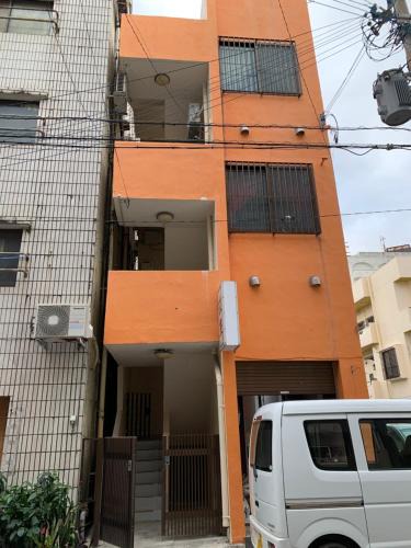Maejima House | Maximum of 21 people can be rented in one building 3 minutes walk to Tomari Port 10 minutes drive to the airport No parking lot 30 seconds walk from paid parking lot warayunso port city May