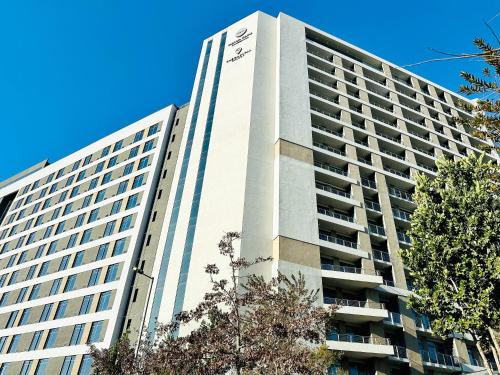 Menlyn Apartment | Menlyn Maine Residences - Paris king sized bed