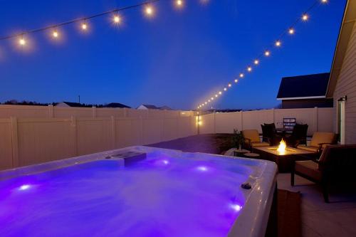 Meridian House | Mineral Soak Rockers Fire Pit Game Room Fun