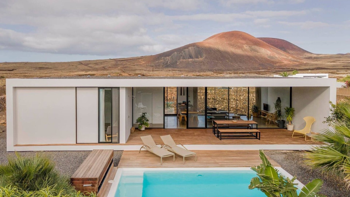 Lajares House | Minimalist house with heated pool and great volcano view