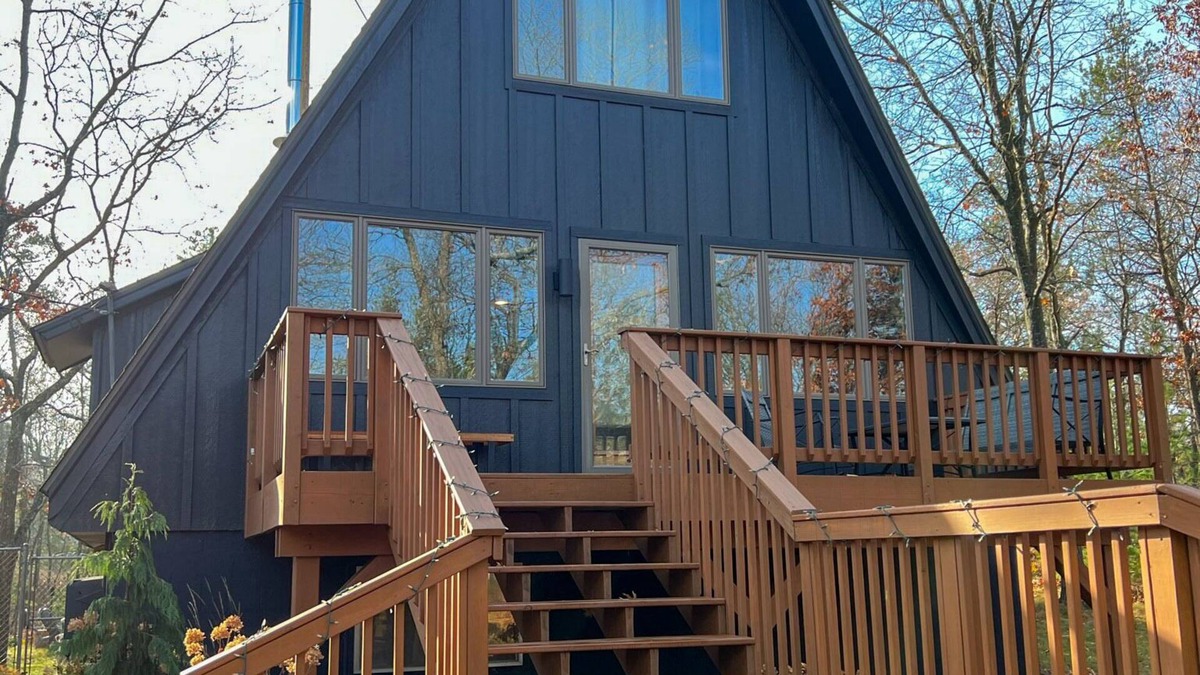 East Tawas Ski Chalet | Modern A-Frame on fenced, wooded Lot. Pet friendly!