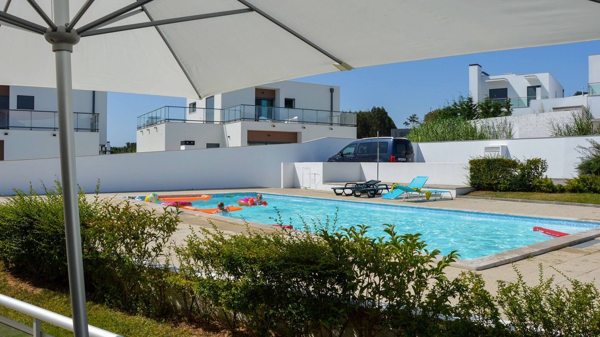 Salir do Porto Apartment | Modern, air-conditioned family apartment with pool. 10 minute walk to beach