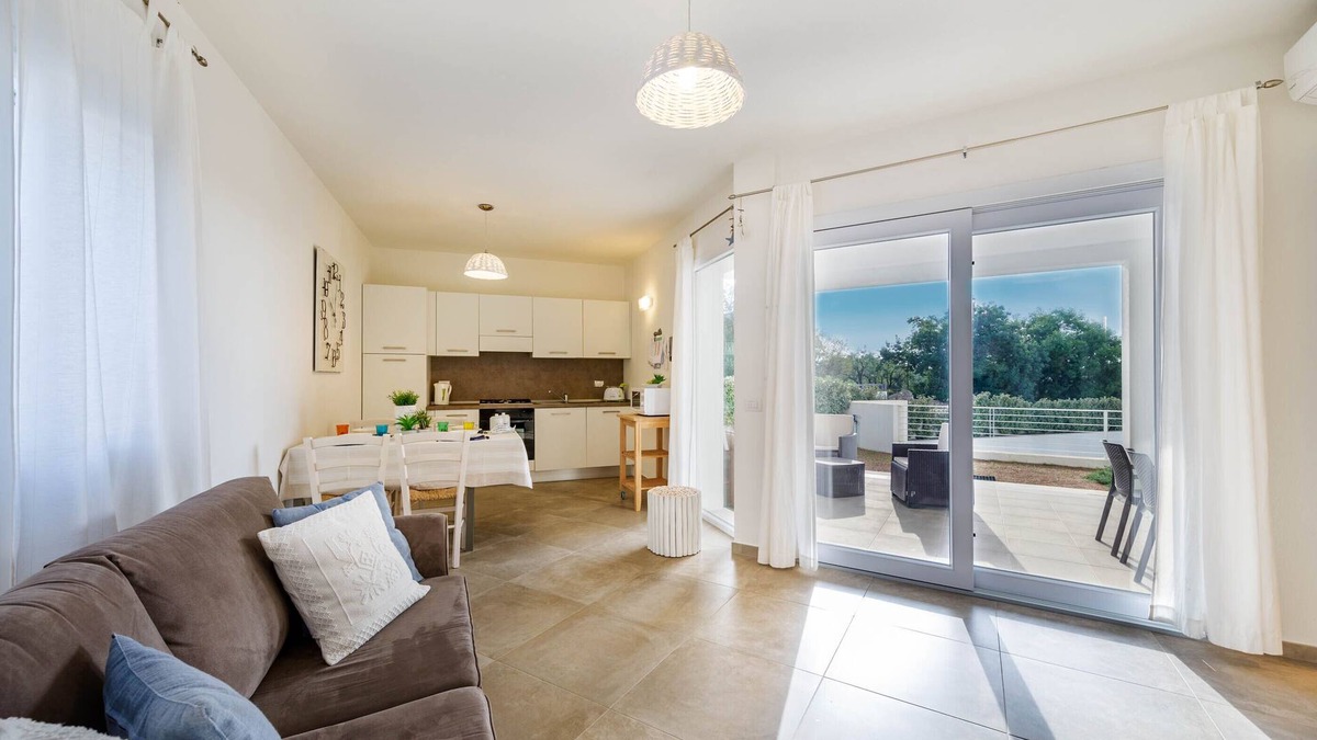 Monte Petrosu Apartment | modern apartment 5 min from the sea with air conditioning, swimming pool, wi-fi