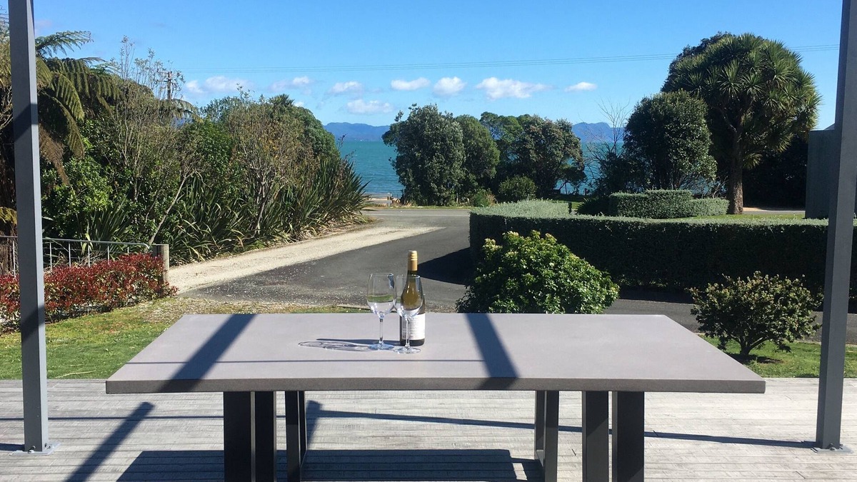 Tata Beach House | Modern beachfront accommodation with water views