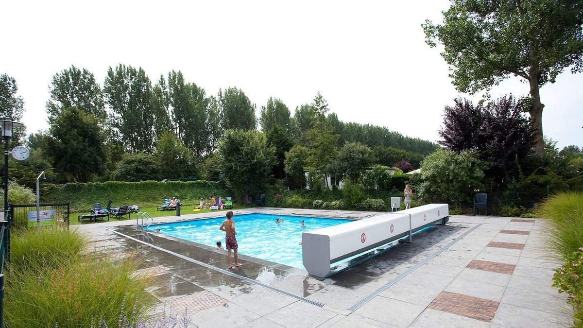 Municipality of Langedijk Ski Chalet | Modern chalet with a fireplace in a holiday park