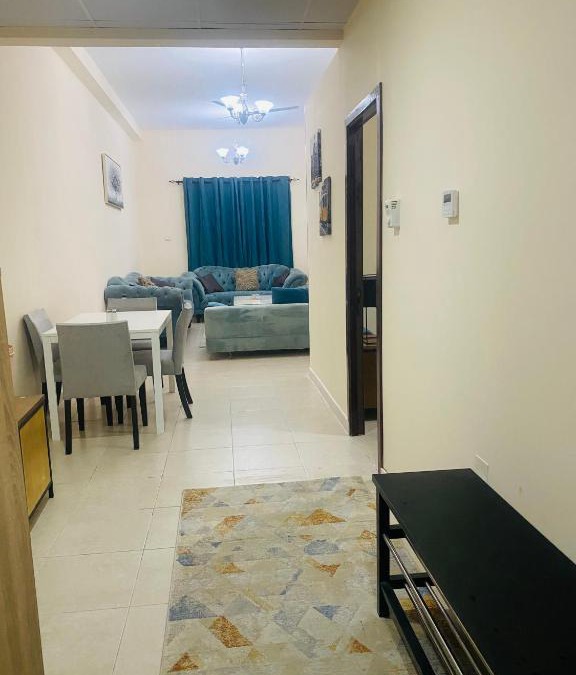 Emirates City Apartment | Modern comforts of 311 to Dubai