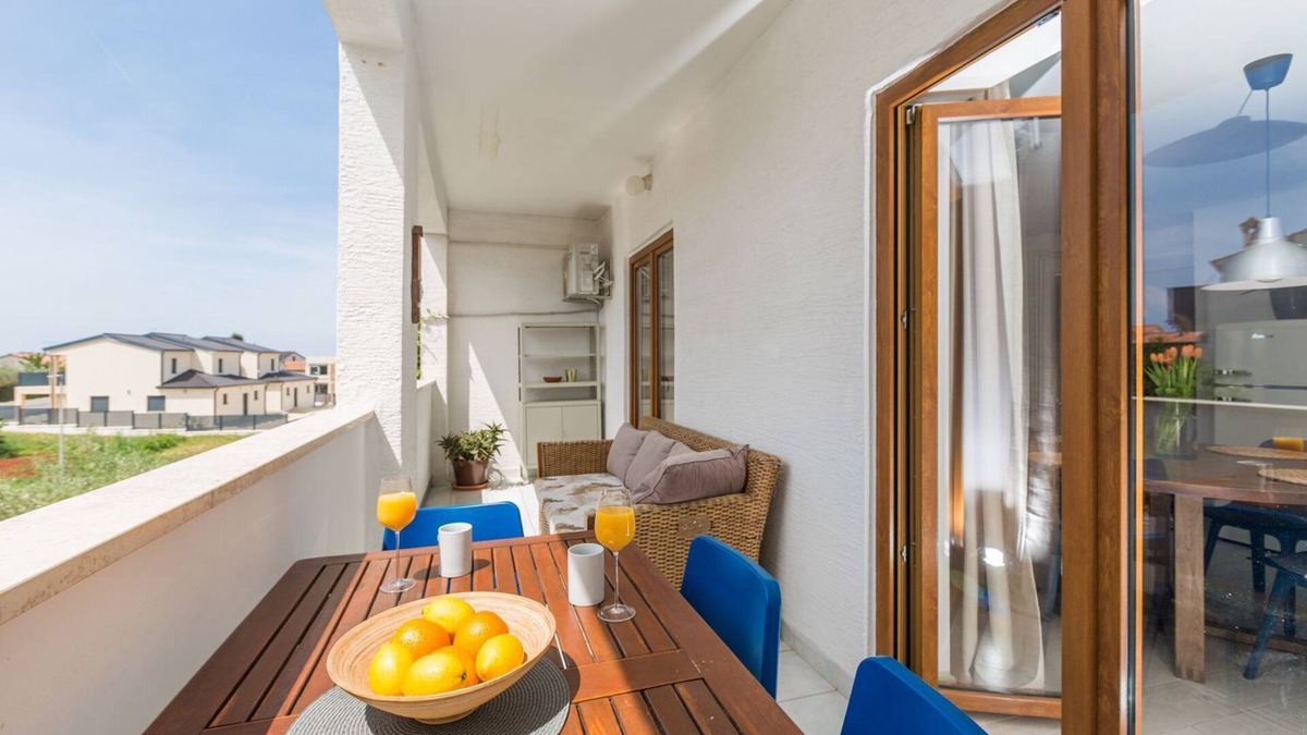 Gulici Apartment | Modern flat with stylish furnishings, sea view, private balcony, barbecue, air conditioning, WiFi