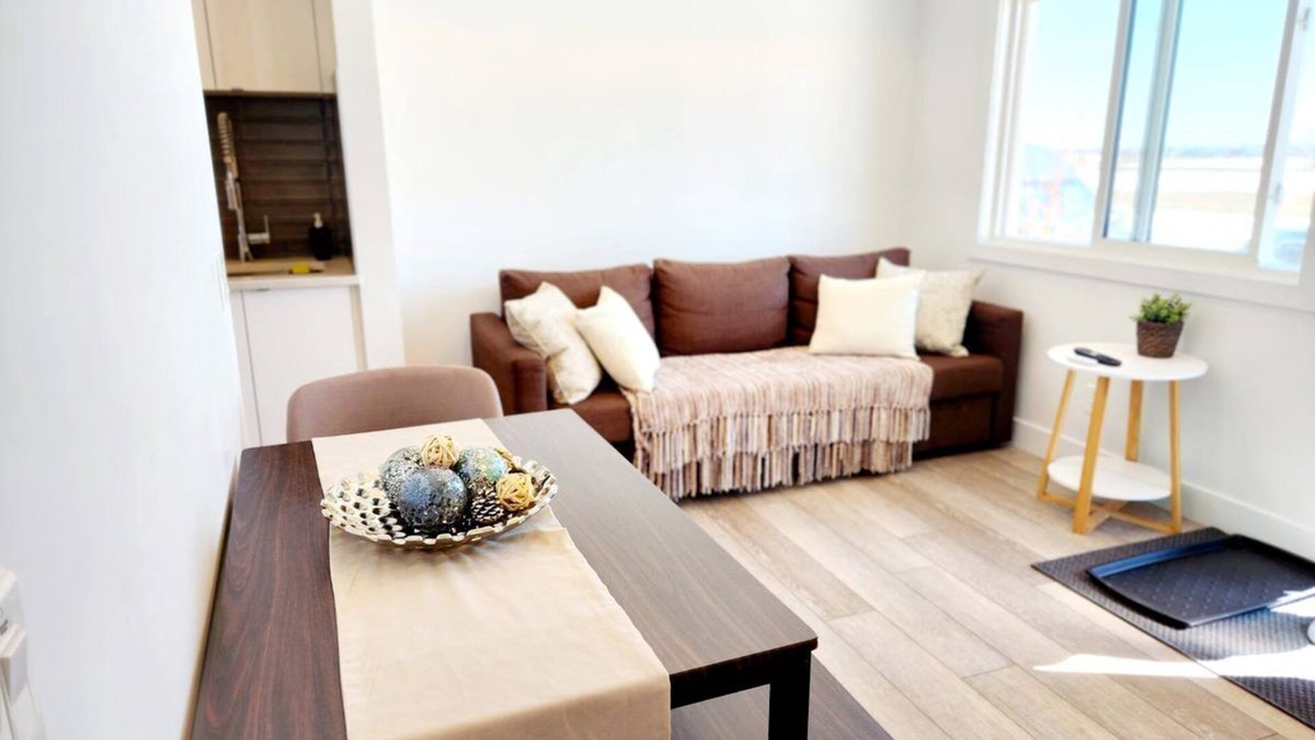 Southeast Calgary Condo | Modern Ground-Level Condo, Private Entrance, Walk to Shops, YMCA, Sleeps 4
