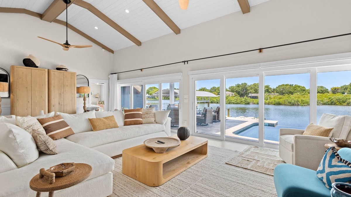 Clearwater House | Modern indulgence with media room, expansive waterway views, AC, WD and Wifi