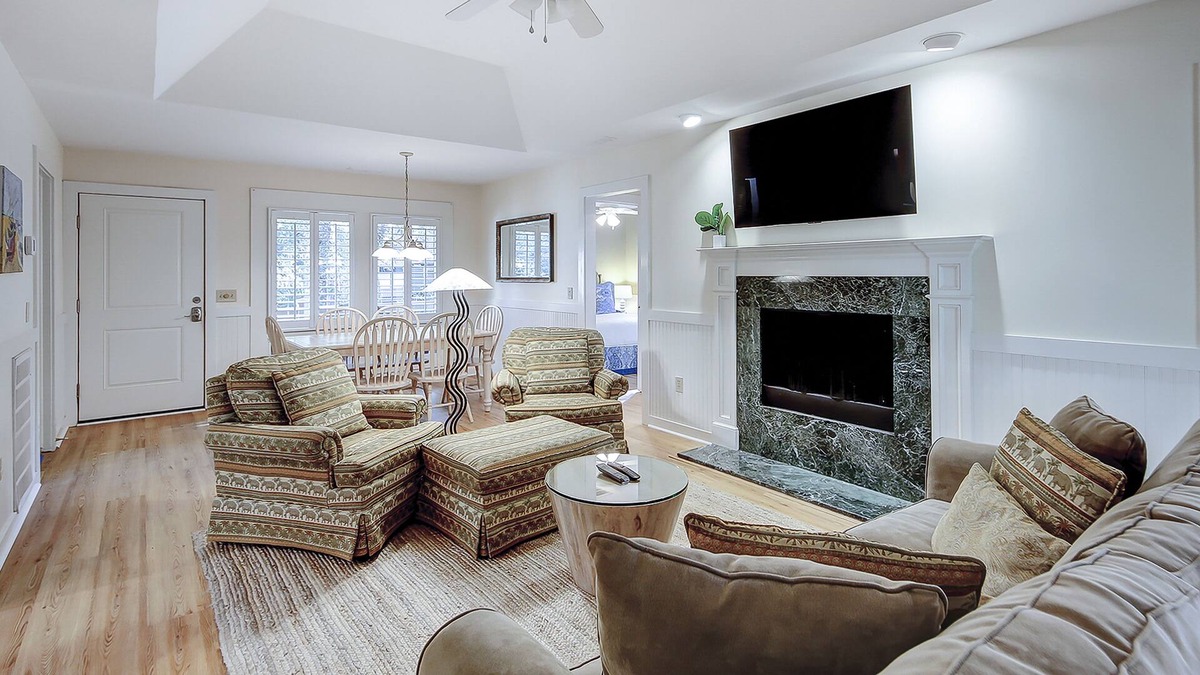 West Beach Condo | Modern, one-level condo near beach & golf with deck, sunroom, & pool