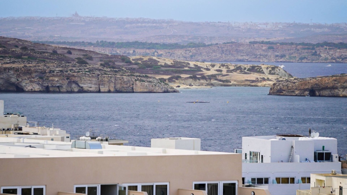 Qawra Apartment | Modern penthouse with a spacious terrace and view