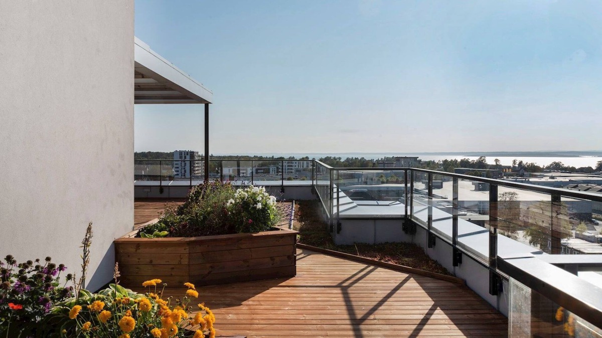 Moss Municipality Condo | Modern Scandinavian apartment with two balconies, roof top terrace and parking.