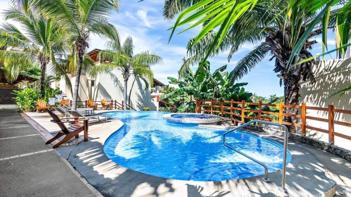 Coco Sunset Hills Apartment | Modern Split-Level 2-Bedroom Condo with Pools, Terrace & Easy Beach Access