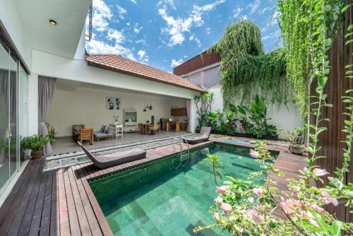 Dewi Sri Bed & Breakfast | Modern Tropical 2BR Villa in Seminyak Kuta with Pool & Garden
