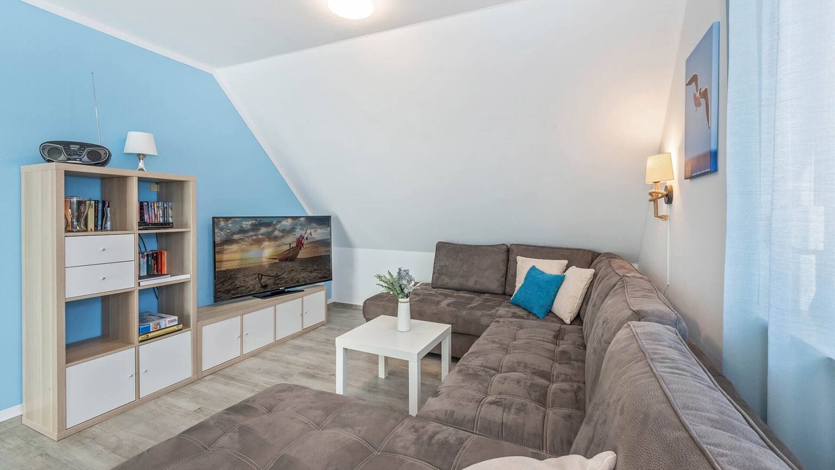 Loddin Apartment | Modern vacation apartment in Loddin with garden, WLAN & playground - quiet and on the beach