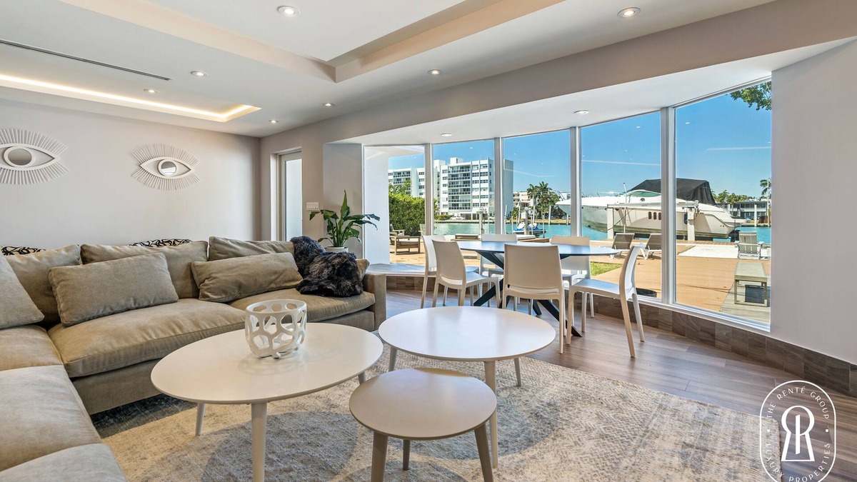 Surfside Villa | Modern Waterfront Villa in the Heart of Surfside with heated pool on the bay