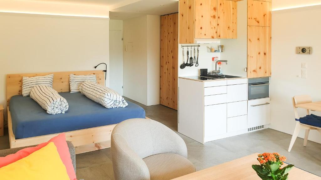 Champfer Apartment | Modernes Alpenstudio mit Bergblick, Pool und Sauna