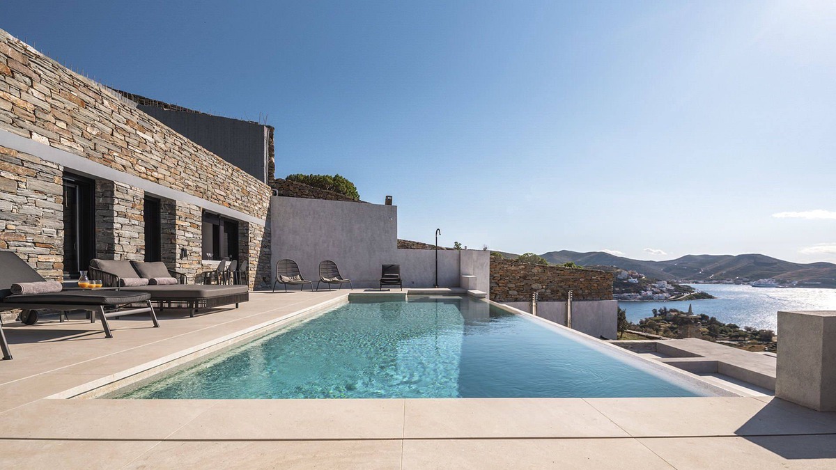 Vourkari Villa | My Rental Homes - Villa Kronos with lounge area and a heated Jacuzzi-plunge pool.