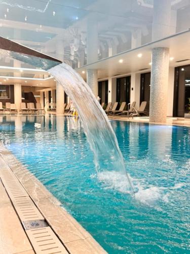 Dzielnica Uzdrowiskowa Apartment | Nadmorskie Tarasy Apartament SORRENTO z garażem,basen, sauna,jacuzzi