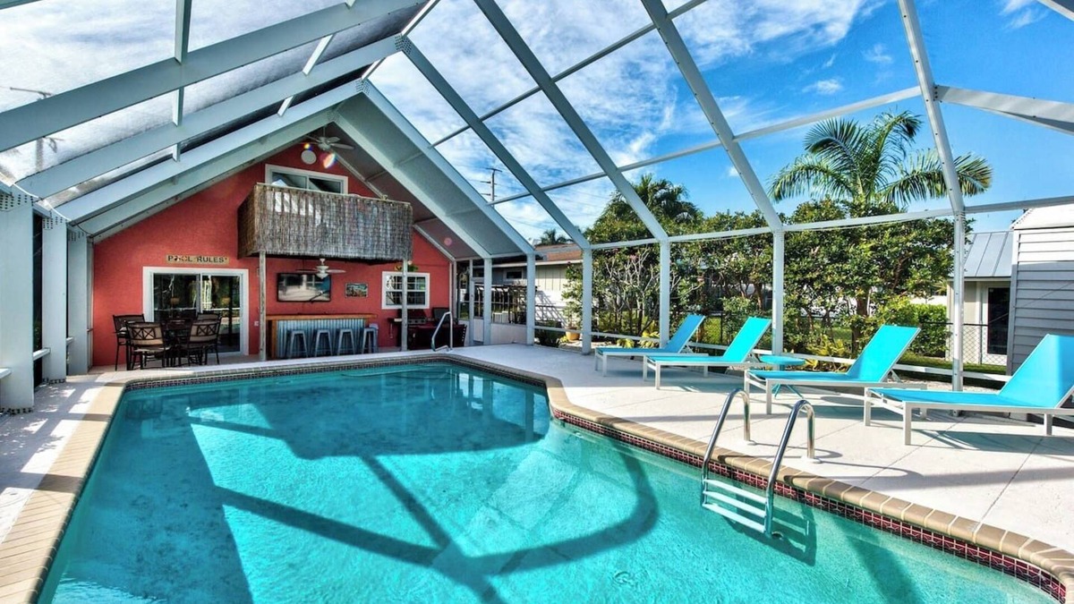 East Naples House | Naples Beach Escape | Pool, Canal Views & Tiki Vibes Near Pier & 5th Avenue