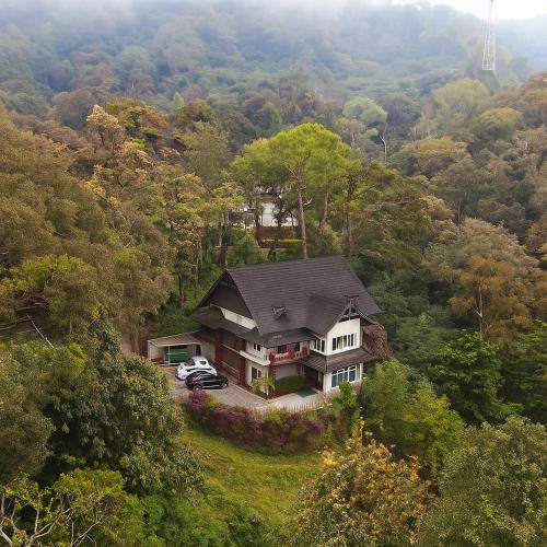 Giridih Hotel | Nature Valley Farmhouse Resort by Raarees, Munnar #lap of nature #premium rooms #parking #Scenic view #garden with fireplace #property of the year