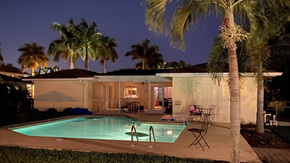 Royal Harbor House | Near Downtown Naples Canal front with 16,000 Lb boat lift, heated pool. Sleeps10