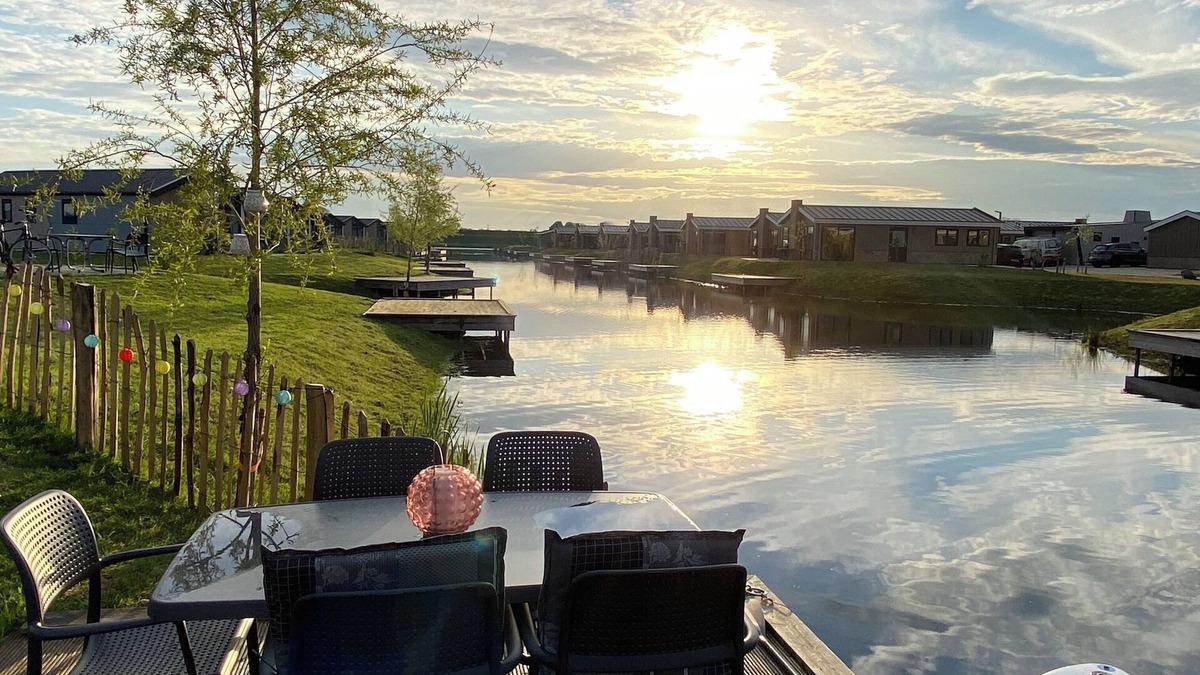 Municipality of Kampen House | NEW Elegant Holiday Home Chalet on a Lake in Kampen, Netherlands Boat waterfront