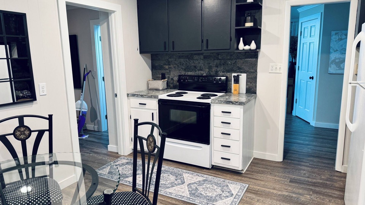 Interlochen Cottage | New~Enchanting modern cottage tucked away in the trees. Heavenly Kingsize Bed