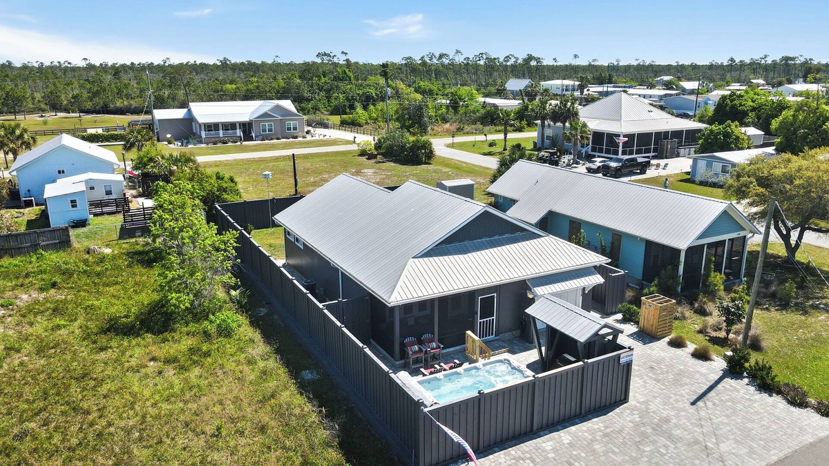 Port St. Joe House | NEW LISTING! Special Shell features 2BD/2BA w/private, fenced yard, swim spa, outdoor fireplace!