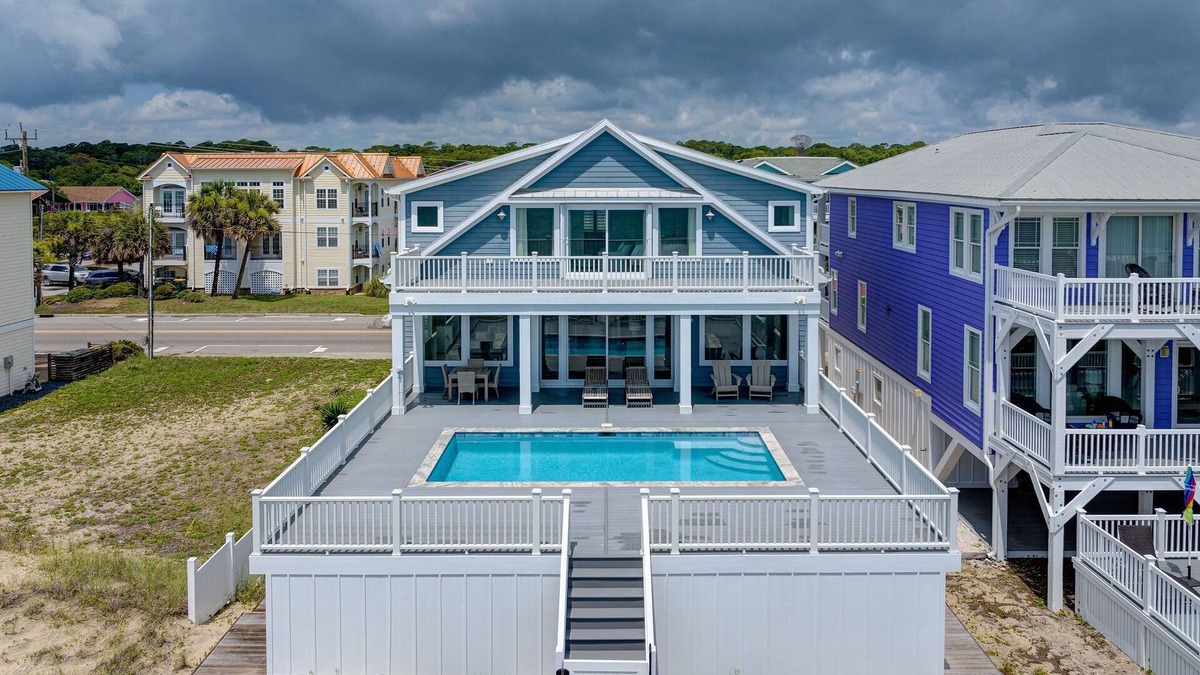 Kure Beach House | NEW! Ocean Front luxurious 6 bedroom home Pool, Elevator, and on the Beach!