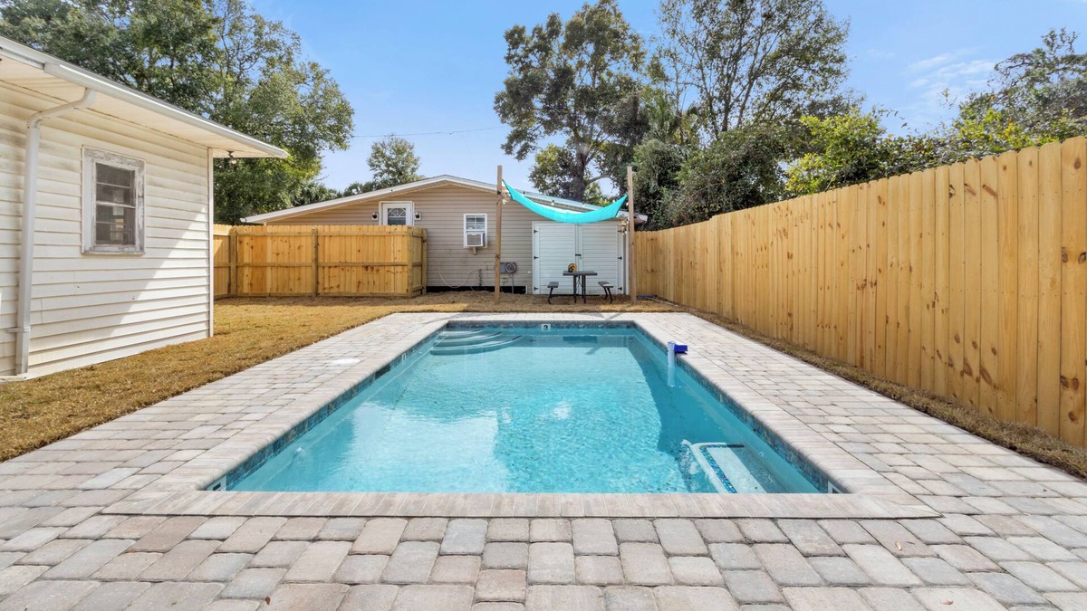 East Pensacola Heights House | NEW POOL NOW AVAILABLE FOR USE! Unit was meticulously furnished to give a coastal/farm house vibe